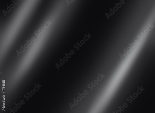 Black shiny metal  sheet dark background texture with a copy space for your text. photo