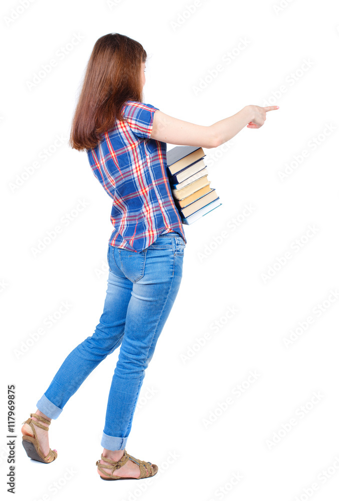Girl carries a heavy pile of books. back view. Rear view people collection. backside view of person. Isolated over white background. Girl in plaid shirt cancer is holding a stack of books and Girl carries a heavy pile of books. back view. Rear view people collection. backside view of person. Isolated over white background. Girl in plaid shirt cancer is holding a stack of books and