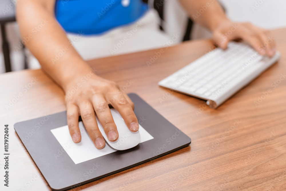 Closeup on person hands working typing, office desk background. Top view flat lay style Closeup on person hands working typing, office desk background. Top view flat lay style