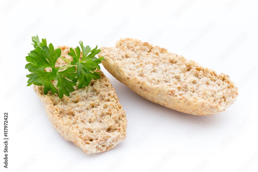 Dry flat bread crisps with herbs on a white background. Dry flat bread crisps with herbs on a white background.