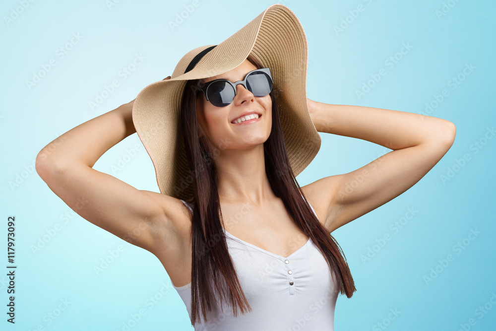 Young pretty woman in a straw hat Young pretty woman in a straw hat