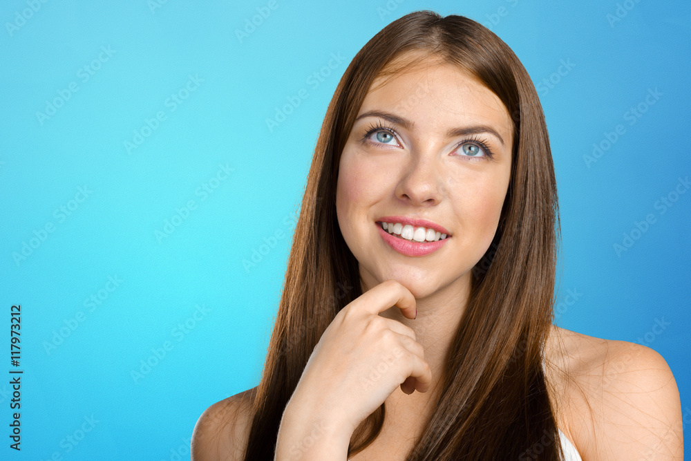 Portrait of an attractive young woman thinking deeply Portrait of an attractive young woman thinking deeply