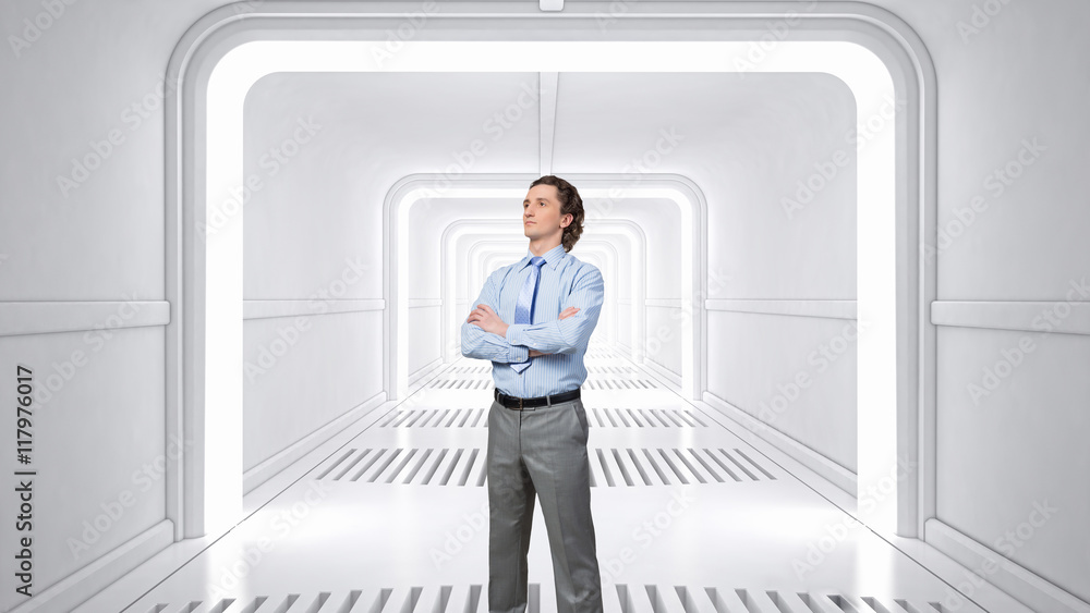Man in futuristic interior . Mixed media Man in futuristic interior . Mixed media