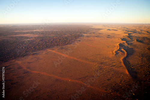 Aerial View of Desert Outback Australia at Sunset (near Ayres Rock - Uluru)