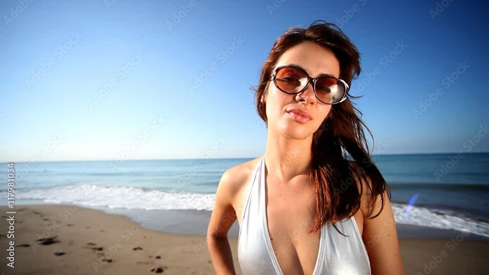 beautiful girl poses on the beach beautiful girl poses on the beach