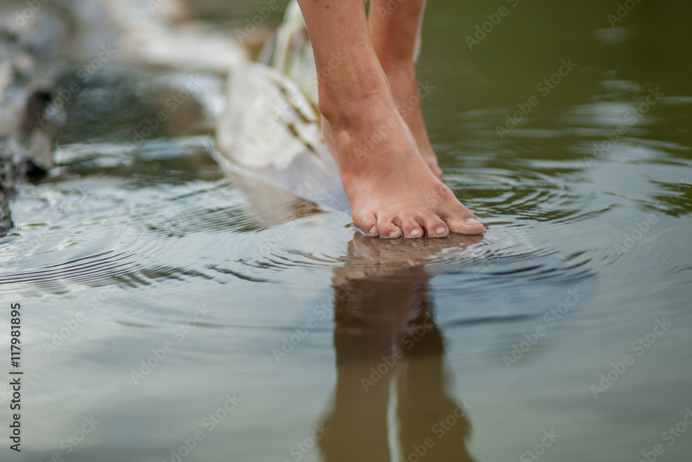 Girls legs on the water Girls legs on the water