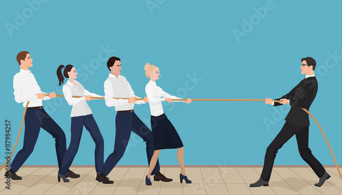 Powerful strong businessman competing with group of businessmen office people team playing tug of war battle. Business concept.