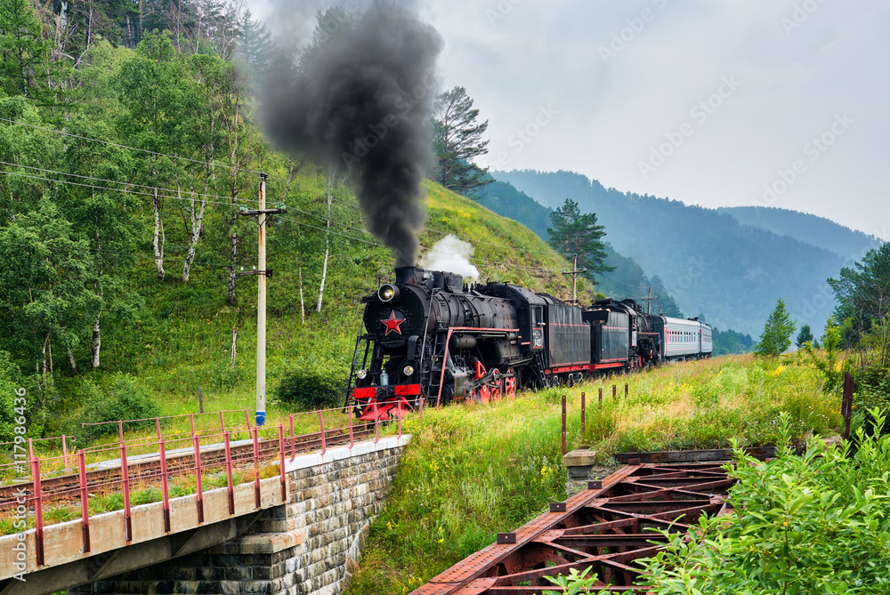Obraz premium Steam train rides on Circum-Baikal Railway