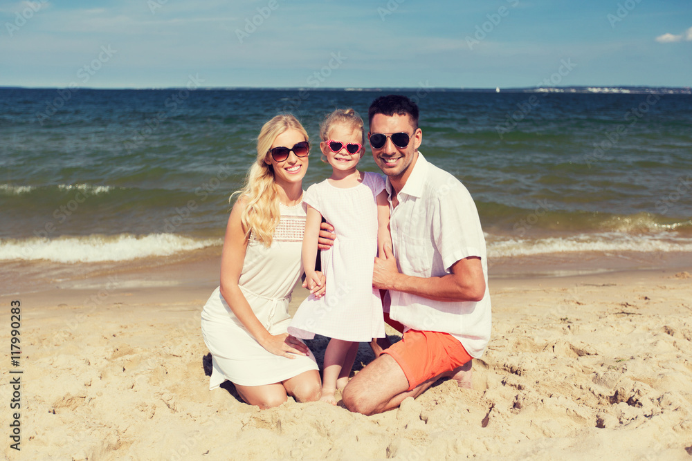 happy family in sunglasses on summer beach happy family in sunglasses on summer beach