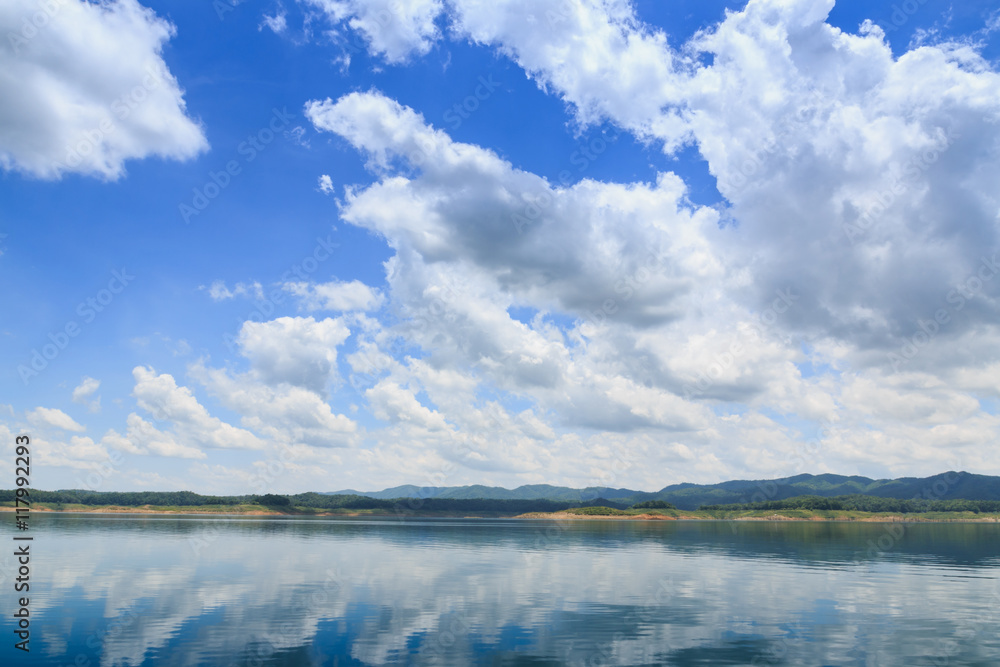 Landscapes blue sky with white clouds water reflection shadow Landscapes blue sky with white clouds water reflection shadow