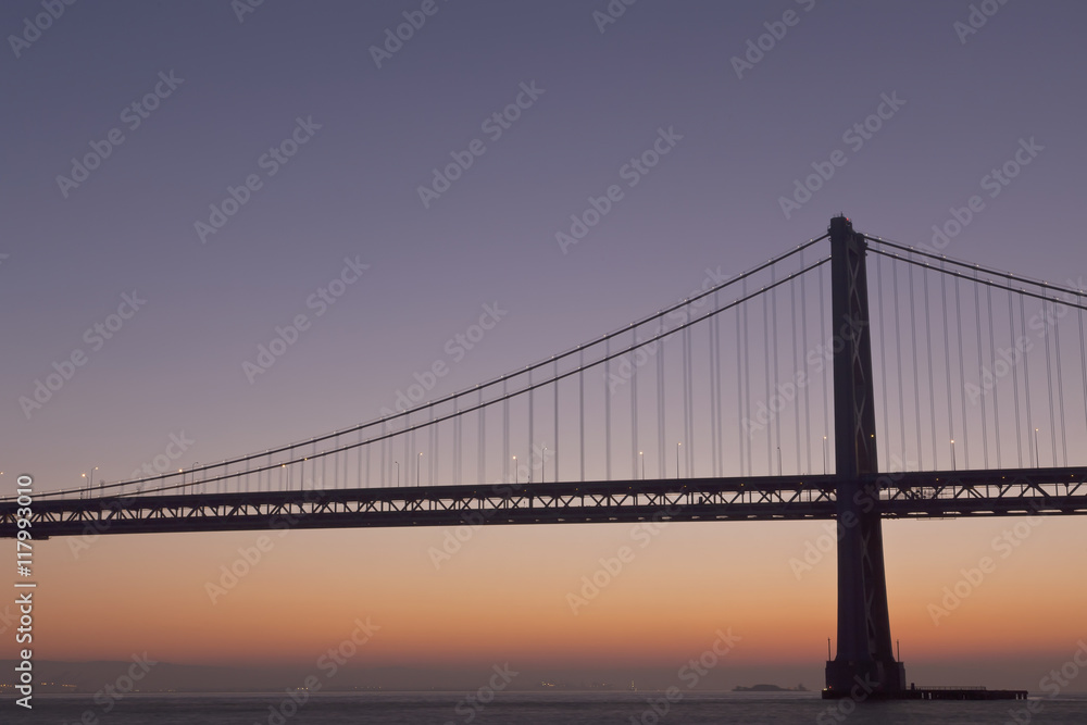silhouette of suspension bridge