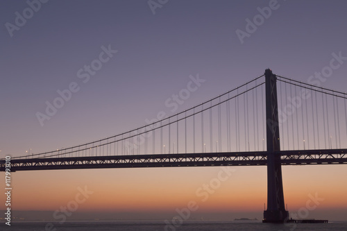 silhouette of suspension bridge