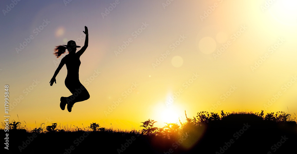 Website banner of a happy female silhouette at sunset Website banner of a happy female silhouette at sunset