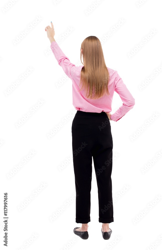 Back view of pointing woman. beautiful girl. Rear view people collection. backside view of person. Isolated over white background. Blonde in black trousers held up a hand up. Back view of pointing woman. beautiful girl. Rear view people collection. backside view of person. Isolated over white background. Blonde in black trousers held up a hand up.