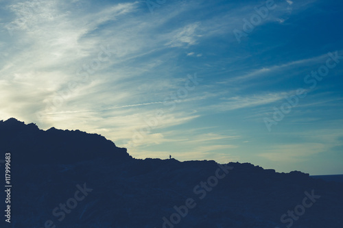 landscape silhouette with blue sky and nice clouds
