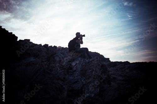 filtered color preset-man taking photos to landscape, summer day