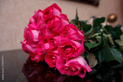 bouquet of pink roses on the table