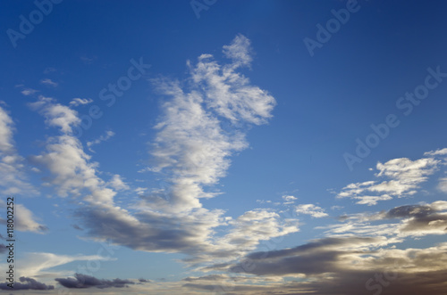 Fototapeta Naklejka Na Ścianę i Meble -  Clear blue sky with white clouds during morning sunrise time