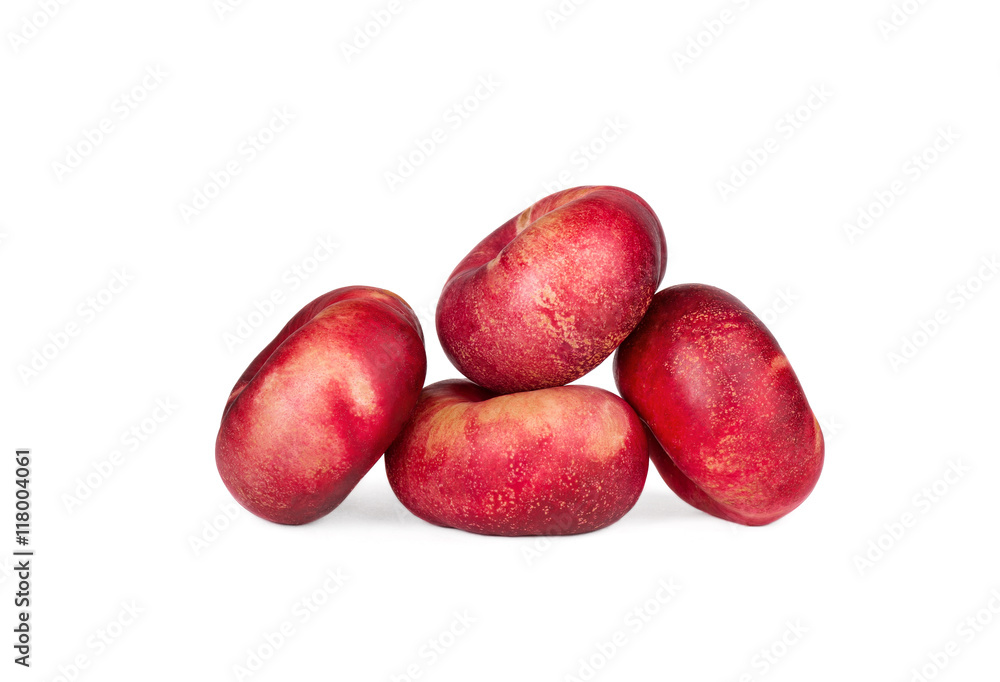 Fresh flat nectarines on a white background Fresh flat nectarines on a white background