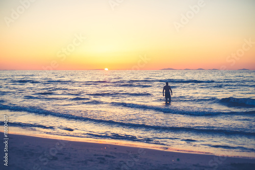 man at the beach, sunset and summer time, holidays, filtered colORS