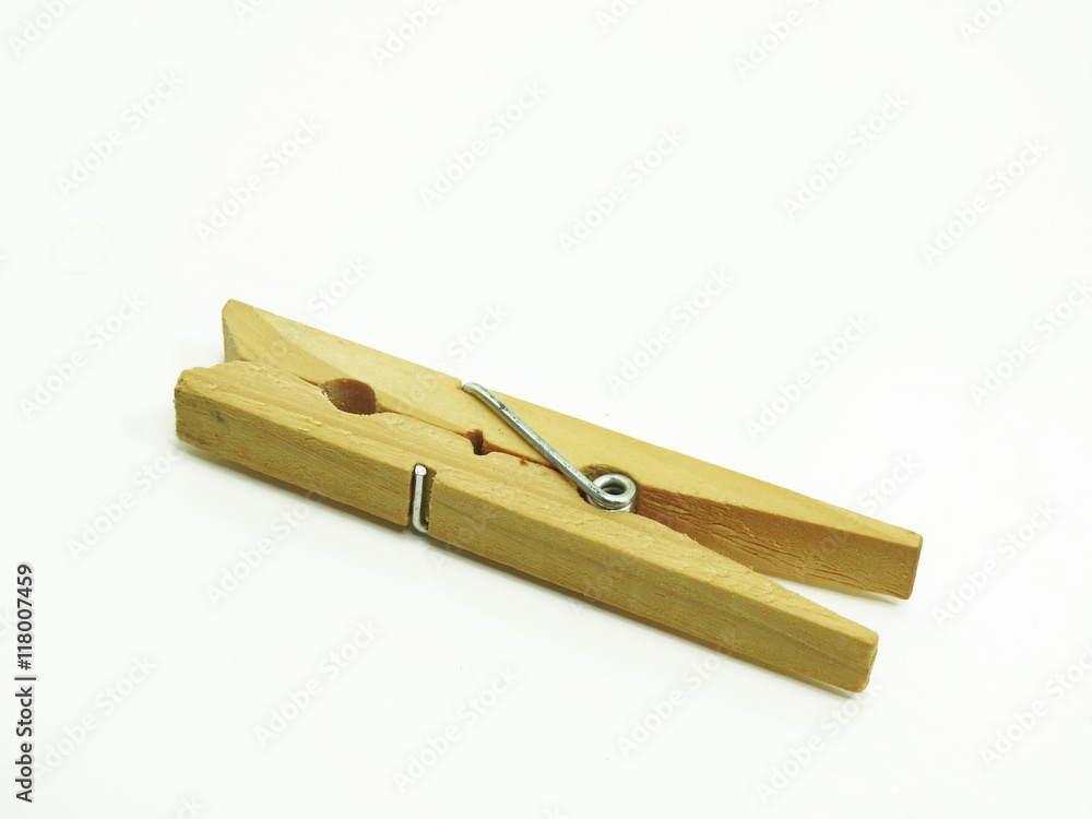 Wooden clothespin isolated on white.