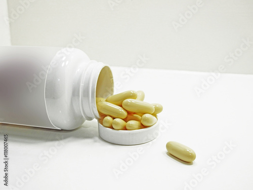 White pills an pill bottle