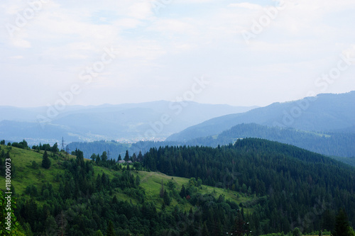 Summer landscape in mountains and the dark blue sky with clouds © Art_man