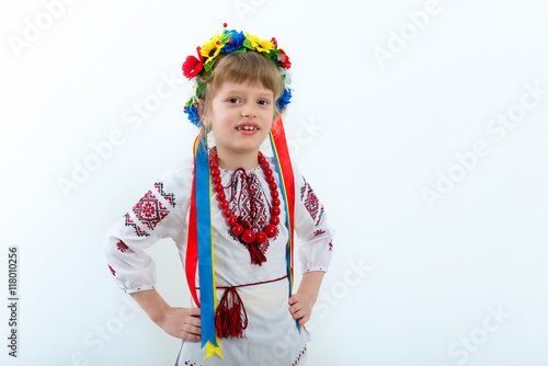 Girl in the Ukrainian national native costume/Beautiful Ukrainian girl in the Ukrainian national native costume on Slavic holiday