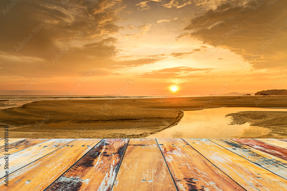 Wood floor top on sunset sky background, Cloudy in yellow sky an