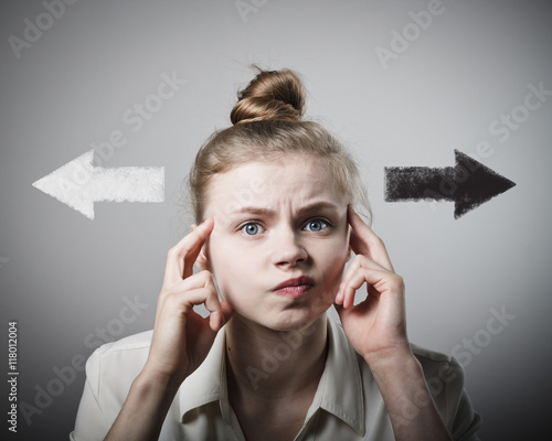 Woman in white and two arrows. photo