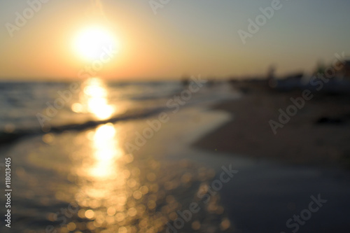 sunset on the beach, out of focus