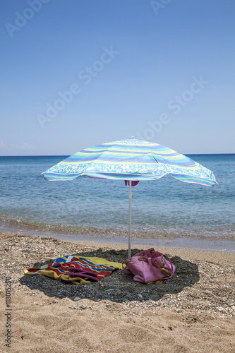 Umbrella on beach. © BrunoWeltmann