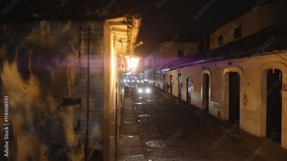 Empty streets of colonial town illuminated with warm lanterns Giron, Colombia Empty streets of colonial town illuminated with warm lanterns Giron, Colombia