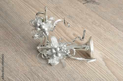 Silver trumpets for decorating a Christmas tree