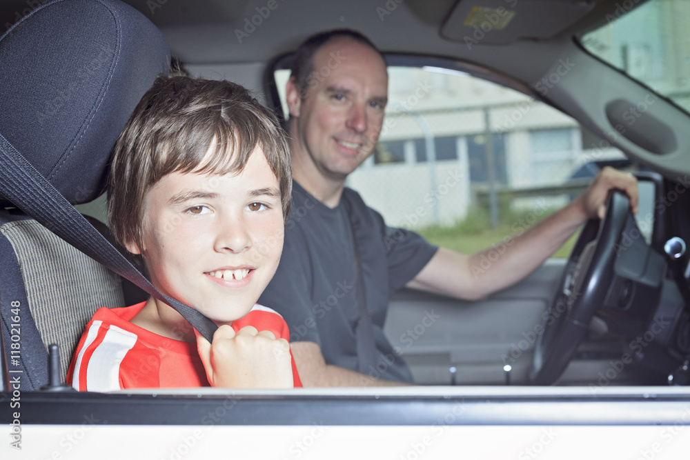 Portrait of smiling boy in the car of his father Stock-Foto | Adobe Stock