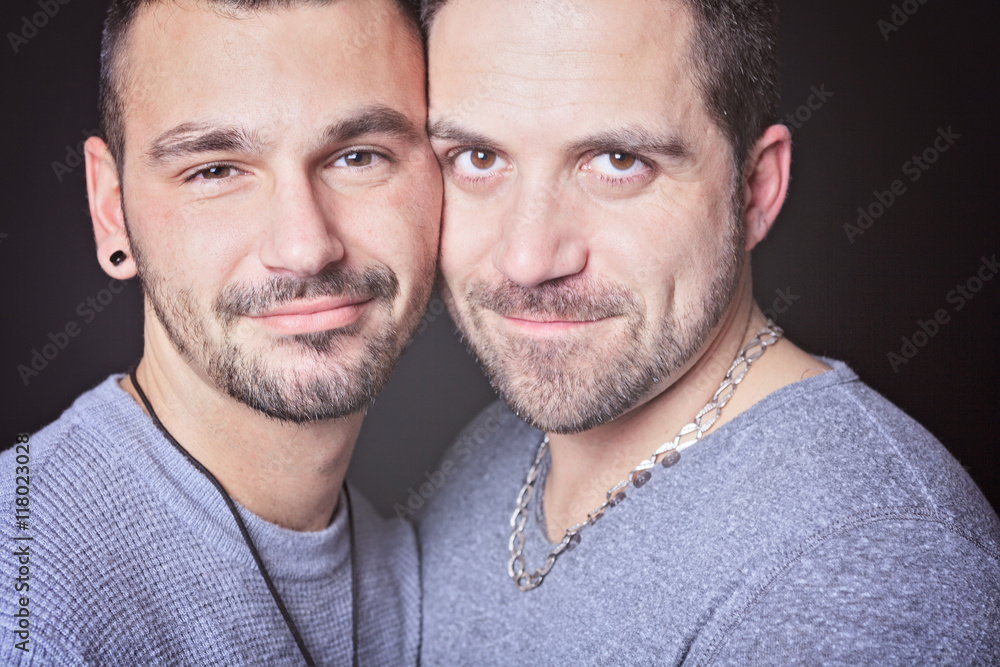 Fototapeta premium Gay couple on black background