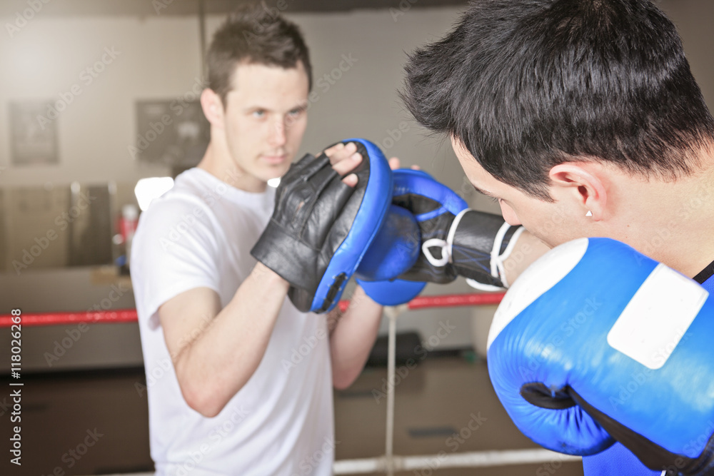 A young boxer who training for his fight A young boxer who training for his fight