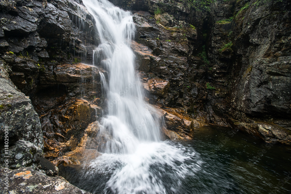 Fototapeta premium Big waterfall on the Kamenka river, in Khamar-Daban ridge
