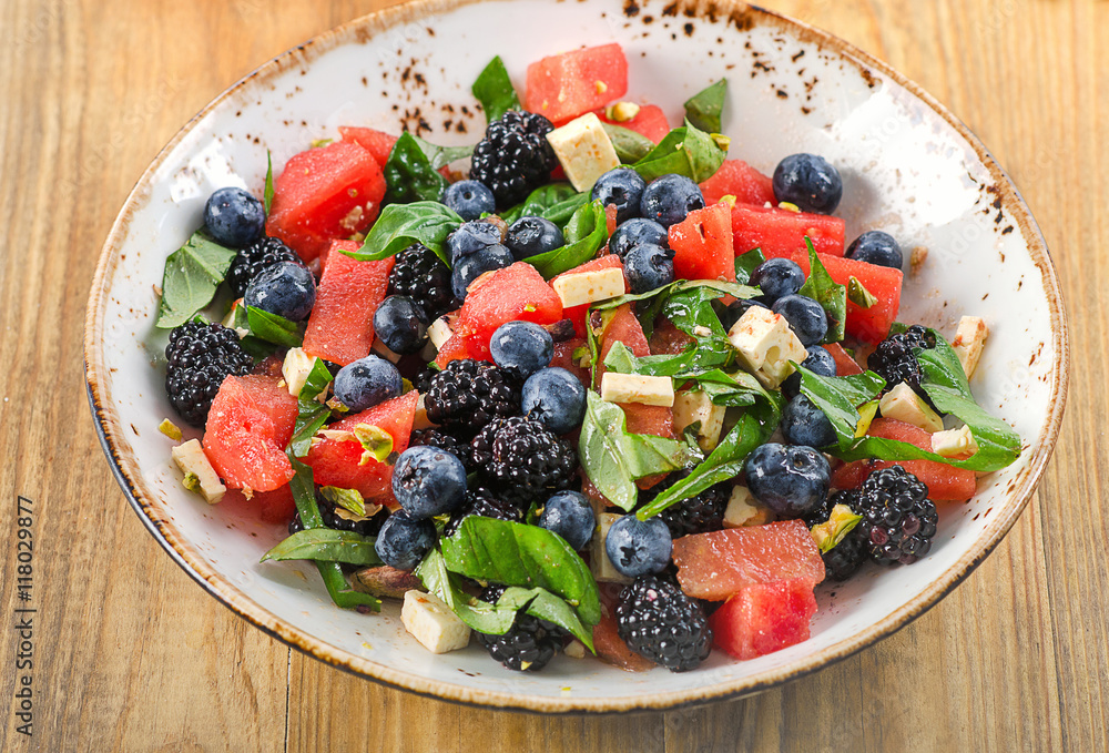 Watermelon Salad with cheese and berries.