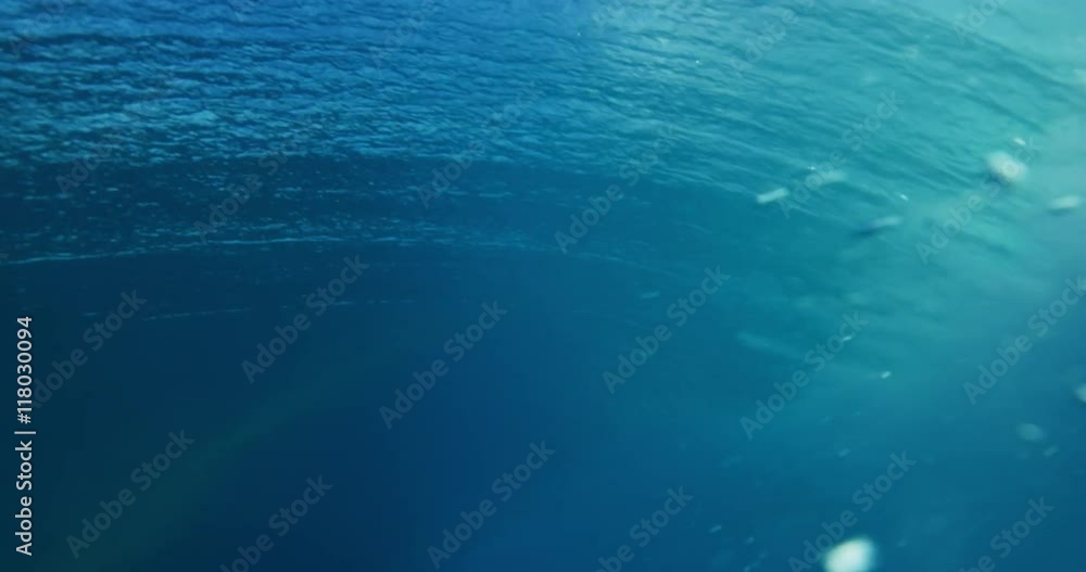 Beautiful blue ocean wave breaking in slow motion Beautiful blue ocean wave breaking in slow motion