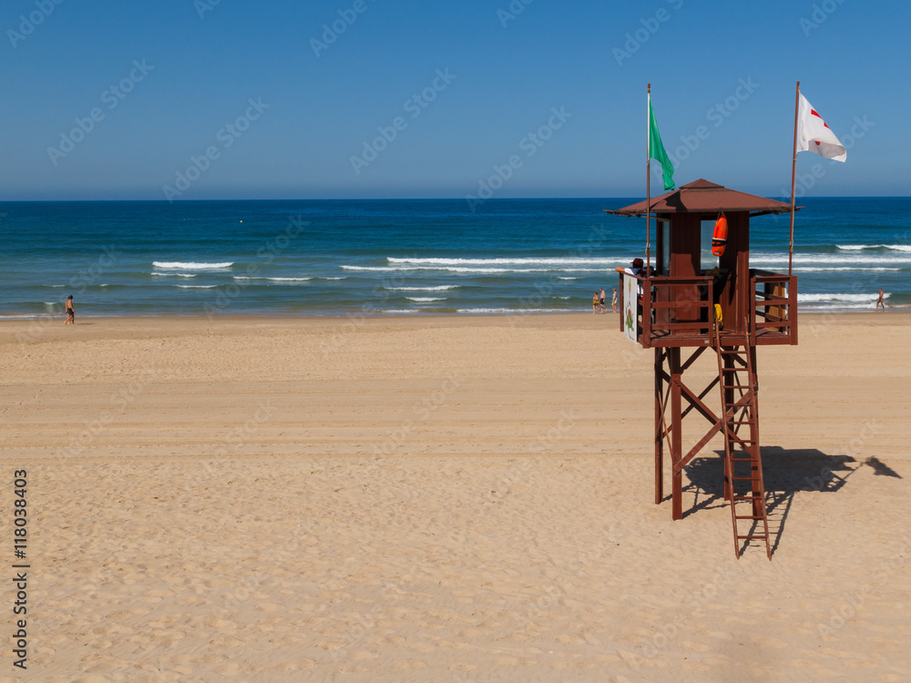 Lifeguard on the beach of La Barrosa, Cadiz, Spain