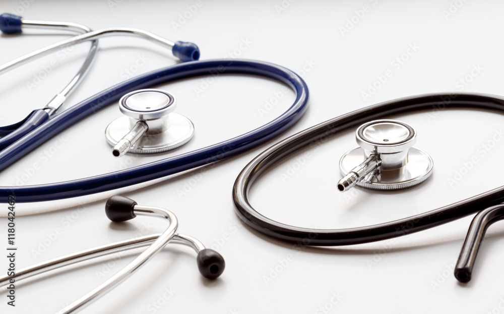two disassembled stethoscope in white background two disassembled stethoscope in white background
