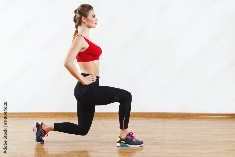Fit girl doing physical exercises Fit girl doing physical exercises