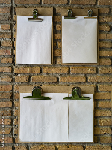 Clipboard with a sheet of paper
