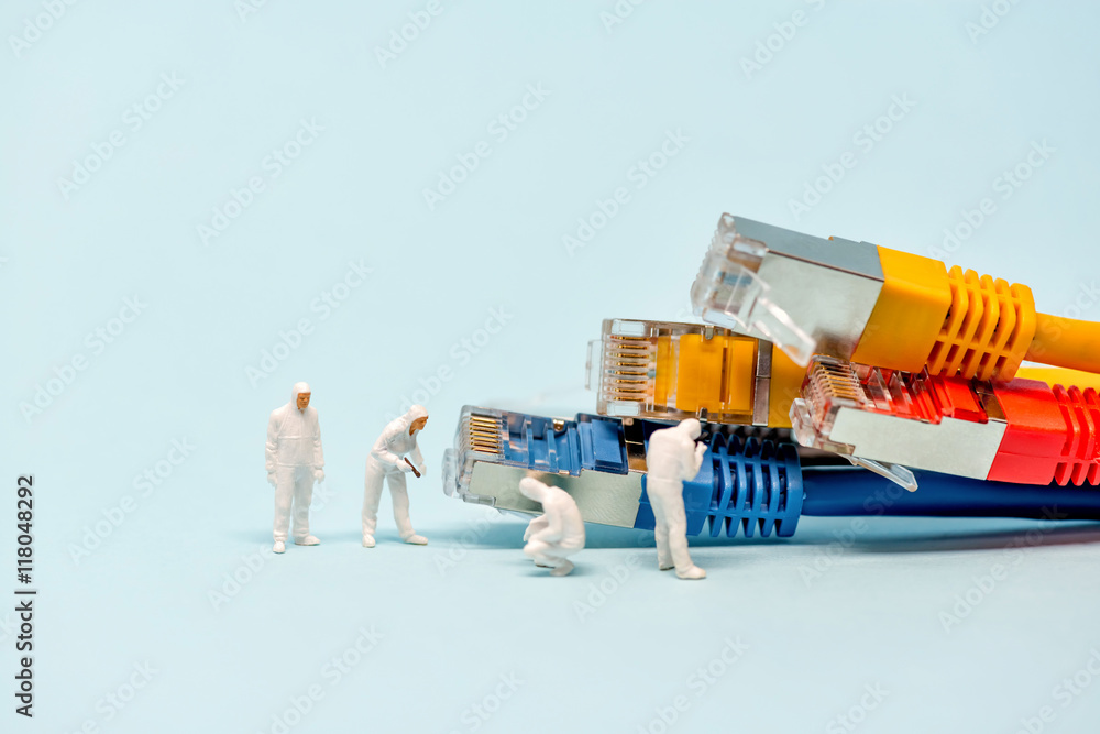 Technicians with multicolored network cables - obrazy, fototapety, plakaty 