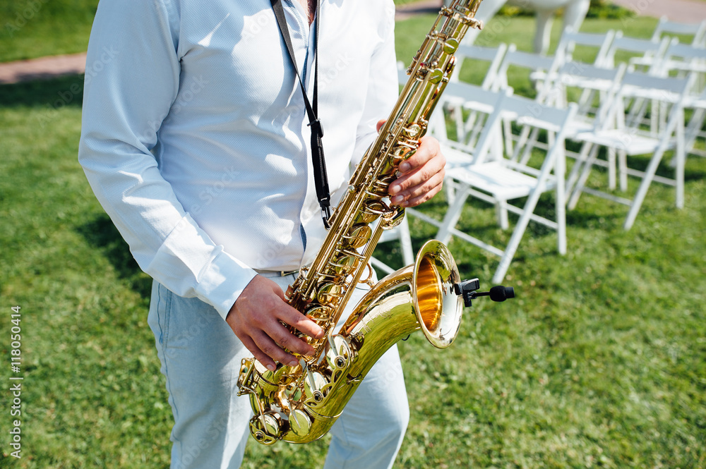 Fototapeta premium Saxophone player jazz music instrument Saxophonist