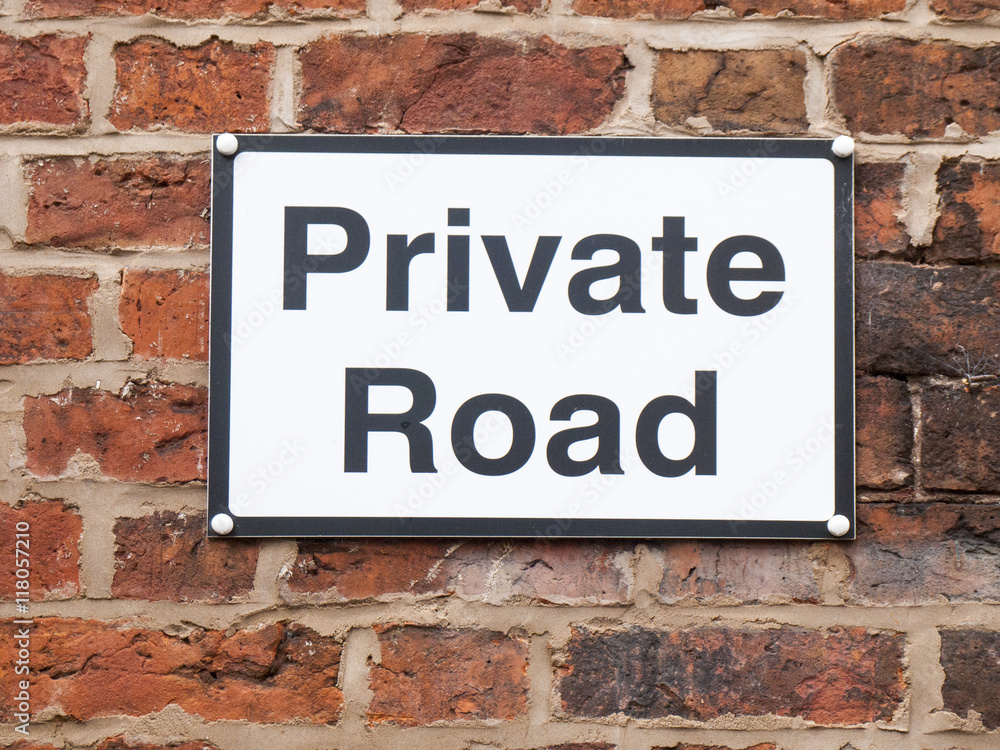 Fototapeta premium Private road sign on outside wall