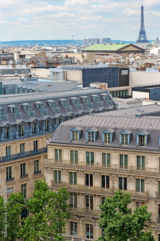 Parisian architecture. View on classic paris buildings and eiffel tower on a background