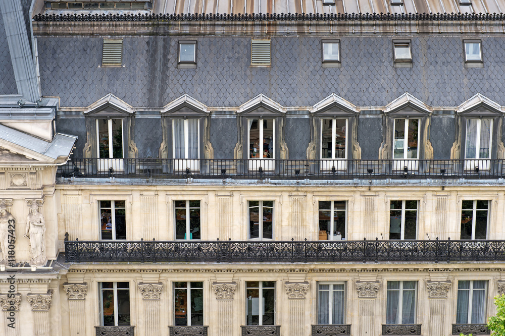 Paris, France. view to the parisian architecture, traditional building with mansard and balcony