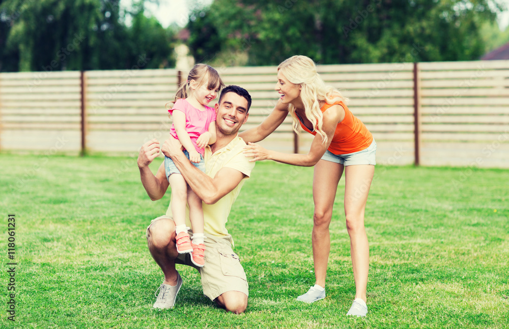 Obraz premium happy family hugging outdoors